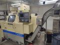 OKUMA Cadet LNC-8C CNC Turning Center, S/N D764, with 10" chuck.