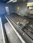 Takumi V32 VMC, 2007 – 4th Axis, CAT50, Box Way, TSC, Chip Conveyor