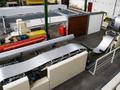 Jensen - Sandwich panel line for sectional gates
