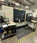 Bulova VMC-4220B Vertical Machining Center 2012 equipped with Fanuc OiMD Control, CT40 Spindle, 24 Station Automatic Tool Changer, Remote Jog Handle, Chip Conveyor, Chip Auger, Coolant Tank