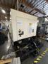 YCM NXV560A-APC VMC, 2015 – Chip Conveyor, Fanuc Control, 12K RPM