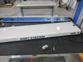 IAC Industries Work Station with Grounding Mat, Grounding Cable, Overhead Work Light, Power Strip and Adjustable Shelving- Auction Item