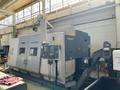Okuma Macturn 350-W Multi-Axis CNC Lathe, 2004 – Chip Conveyor