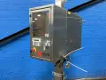 AXON CORPORATION SEALING MACHINE   -  EZ-100