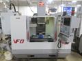 Haas VF-0 CNC Vertical Machining Center, Haas 32-Bit CNC Control, 4th Axis Drive, 20-Station Tool Changer, Programmable Coolant, Remote Jog Handle, Chip Auger - Auction Item