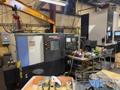 Doosan Puma 2600 CNC Lathe, 2011 – Tailstock, Chip Conveyor, Fanuc 0i Control