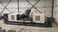 TAKUMI, V32, CNC VERTICAL MACHINING CENTRE, 10,000 RPM SPINDLE, TRAVELS (X,Y,Z): 3200 MM X 1066MM X 750 MM (126&quot; X 42&quot; X 30), DISTANCE FROM NOSE TO SPINDLE:  200MM TO 950MM, DISTANCE FROM SPINDLE NOSE TO THE Z-AXIS GUIDEWAY: 1120MM, T-SLOT TABLE SIZE: 3200MM X 1025MM (126&quot; X 40&quot;), MAX TABLE LOAD, 4500 KG (9,920 LBS), 32 TOOL ATC, TABLE SIZE: 42&quot; X 130&quot;, CAT 50, 30 KW, SPINDLE FLOOD AND THROUGH COOLANT, AIR BLAST, COOLANT FILTER SYSTEM, CHIP WASH DOWN SYSTEM, CHILLED BALL SCREW AND SPINDLE, 4-AXIS CAPABLE,  LEFT AND RIGHT CHIP CONVEYOR,  MITSUBISHI, MEDLAS 60S, CNC CONTROL, 2006, 220/3/60 50 AMP, MACHINE WEIGHT:  52.500 LBS. FLOOR SPACE (W, L, H) 295&quot; X 173&quot; X 139.7&quot; (APPROX.), S/N K0133