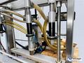 Liquid Packaging Solutions Model: 310-150  ||  Semi-Automatic Table Top Overflow Filler
