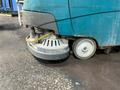 TENNANT WALK BEHIND FLOOR SCRUBBER  -  MODEL T5