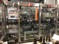 Krones Kosme 150 BPM Complete Bottling Line, 2014 – 28-Valve Filler, 7-Head Capper, Labeler, Depalletizer &amp; Case Packer