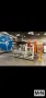 2 ARM ROTOLINE MODEL DC3.00XT ROTATIONAL MOLDING MACHINE MFG 2000