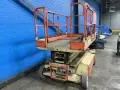 JLG 26 FT MAX HEIGHT, 1000 LBS, 3000 PSI SCISSOR LIFT  -  2658-E