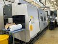 Okuma Macturn 350-W Multi-Axis CNC Lathe, 2004 – Fanuc M-16iB (20T) Robot and Gantry, Chip Conveyor