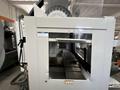 HAAS VM-2 CNC Vertical Machining Center 2011 equipped with quipped with 30"x20"x20" Travels, Haas Control, 4th Axis Drive, 24 ATC Side Mount Tool Changer, Tool Pre-Setter, Cool, Chip Auger