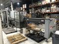 Krones Kosme 150 BPM Complete Bottling Line, 2014 – 28-Valve Filler, 7-Head Capper, Labeler, Depalletizer &amp; Case Packer