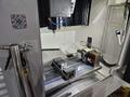 Okuma Genos M560-V CNC VMC, 2022 – Low Hours, TSC, Probes, 4th Axis, Chip Conveyor, 15K Spindle
