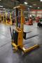 Uline H-5439 Electric Straddle Stacker Lift, 2,200# Cap, 63" Max Height, 50" Between Outriggers, 12 Volt Battery with Charger, 42" Forks- Auction Item