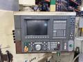 Okuma LU15 CNC Lathe, 2002 – Tailstock, Chip Conveyor