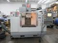 Haas VF-2 CNC Vertical Machining Center with 15,000 RPM CT-40 Spindle, High Speed Machining, Side Mount Tool Changer, 4th Axis Ready, Macros, and Chip Auger.