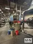 3 ARM MCNEILL MODEL 1500-64 ROTATIONAL MOLDING MACHINE