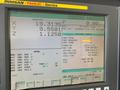2014 DOOSAN MYNX 5400 with Chip Conveyor Vertical Machining Center