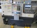 Okuma Genos L250E CNC Turning Center, OSP-P300L/R CNC Control, 8&quot; Chuck, Tool Setter, Parts Catcher, 12-Station Turret, Tailstock, Chip Conveyor