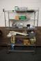 Rolling Wire Racking Unit with 6 Adjustable Shelves and Assorted Contents- Auction Item