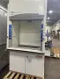 Used Labconco 4' Protector Premier Laboratory Hood with built-in explosion-proof exhaust blower and storage cabinet