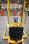 Uline H-5439 Electric Straddle Stacker Lift, 2,200# Cap, 63" Max Height, 50" Between Outriggers, 12 Volt Battery with Charger, 42" Forks- Auction Item