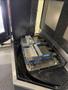 YCM NXV560A-APC VMC, 2015 – Chip Conveyor, Fanuc Control, 12K RPM