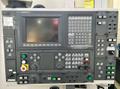 Okuma Macturn 350-W Multi-Axis CNC Lathe, 2004 – Chip Conveyor