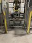 2005 Eagle automated saw and knockout system s/n 05027 with enclosure with light curtain, 2005 Fanuc robot model M-900iA 350 s/n r05743652 with Fanuc system R-J3iB controls s/n e05608535, with saw grips, Eagle enclosure with core knockout system, Allen Bradley plc with panelview 700, core butt discharge conveyor with drive, gate and riser dropoff, related conveyors