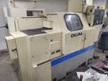 OKUMA Cadet LNC-8C CNC Turning Center, S/N D764, with 10" chuck.