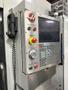 Haas EC-500 Horizontal Machining Center 2014 equipped with Haas CNC Control, CT40 Spindle, 70 Station Automatic Tool Changer, 4th Axis, Probing, Tomb Stones, TSC, Remote Hand Jog, Chip Conveyor, Coolant Pump
