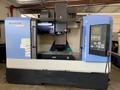 2014 DOOSAN MYNX 5400 with Chip Conveyor Vertical Machining Center