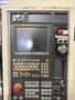 YCM NXV560A-APC VMC, 2015 – Chip Conveyor, Fanuc Control, 12K RPM