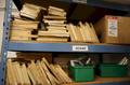 Teardrop Style Racking with 6 Adjustable Shelves and Contentes of Wood Frame Screens, Foam, Fixtures- Auction Item