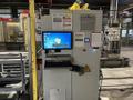 Fanuc - Robot + 3 Breton machining centers 5 axes