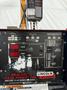 LINCOLN IDEALARC PULSE POWER 500 WELDER W/ BOOM AND LINCOLN LN-9F WIRE FEEDER. STOCK #0627922.