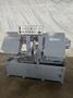13" X 16" PEERLESS HB1316A HORIZONTAL BAND SAW W/ 10' INFEED AND 20' OUTFEED CONVEYOR. STOCK # 1164323.