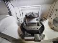 Okuma Genos M460V-5AX 5-Axis CNC VMC, 2021 – Robot Loader, Chip Conveyor, Mist Collector