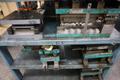 Press Dies on Steel Rack- Auction Item