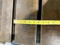 25" WIDE X 89" LONG X 24.5" TALL T-SLOTTED TABLE. STOCK # 0778825