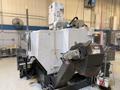 Used 2012 Haas ST-20 CNC Lathe with Bar Feeder For Sale