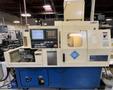 Tsugami BS26-III High-Precision CNC Swiss Lathe equipped with Live Sub-Spindle, Bar Feeder, High Pressure Unit, and Tooling