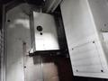 OKUMA CORPORATION 22" X 51" CNC VMC  -  GENOS M560-V
