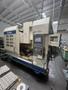 Okuma MC-V4020 VMC, 2005 – 4th Axis Rotary, Chip Conveyor