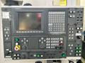 Okuma Macturn 350-W Multi-Axis CNC Lathe, 2004 – Fanuc M-16iB (20T) Robot and Gantry, Chip Conveyor