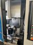 Tornos Almac CU 2007 7-Axis CNC Vertical Machining Center with Part Loading and Parts Catcher System, Probing, 20K Spindle, Lehman 2-Axis Rotary Table, Back Operation Tilting Rotary Vise