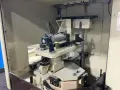 MAKINO MILLING MACHINE CO., LTD. 18”X32” TABLE CNC VERTICAL MACHINING CENTER  -  SNC64-A5